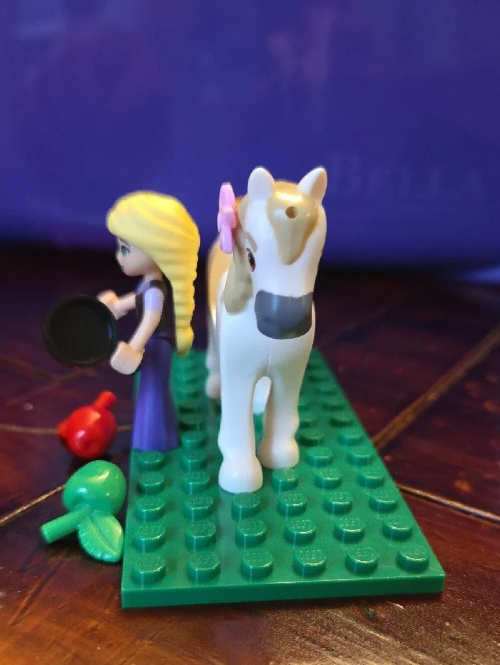LEGO Rapunzel mini figure riding her horse, Maximus.